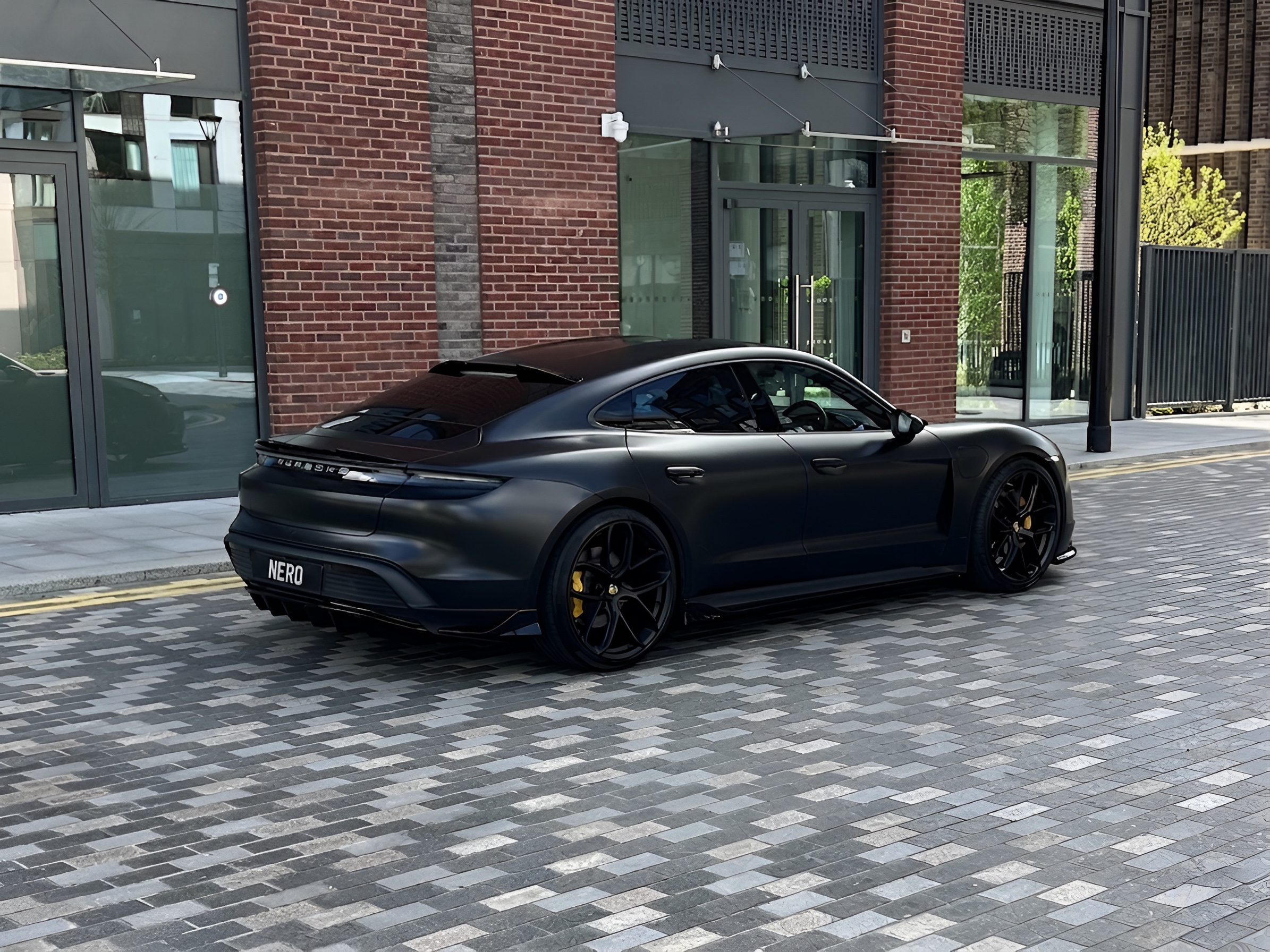 Satin Dark Porsche Taycan Turbo S by NERO — Porsche
